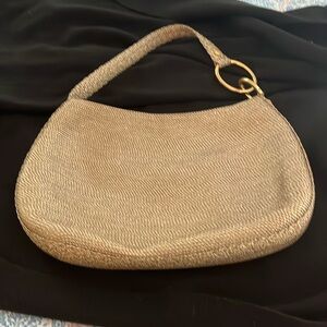 Beautiful golden Eric Javits lined handbag.